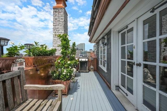 deck featuring french doors and grilling area