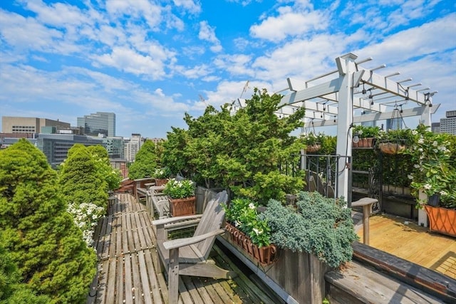 wooden deck featuring a pergola