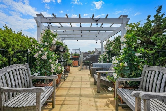 exterior space with a pergola and a deck