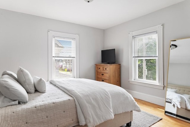 59-61 Elm St, Andover, MA 01810 - bedroom with multiple windows and light wood-type flooring