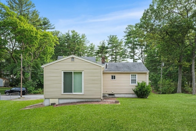 20 Hilltop Dr, Burlington, MA 01803 - back of house with a lawn, a chimney, and roof with shingles