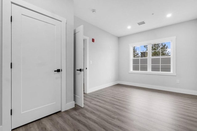 unfurnished bedroom featuring light hardwood / wood-style floors