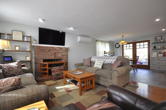 living area featuring a brick fireplace, recessed lighting, and a wall mounted air conditioner