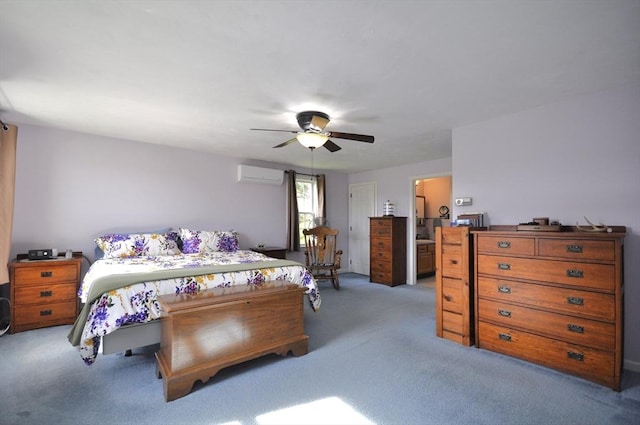 carpeted bedroom with a wall mounted AC and a ceiling fan