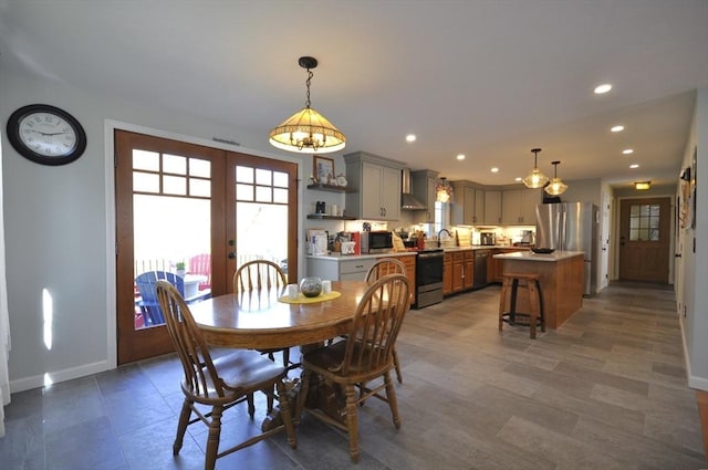 dining room with recessed lighting, baseboards, and french doors