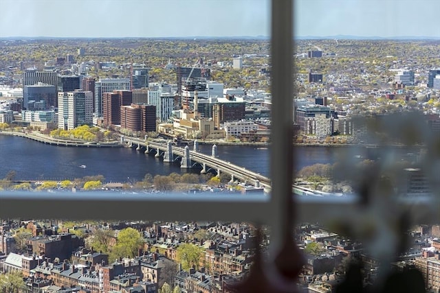city view with a nearby body of water and a notable bridge