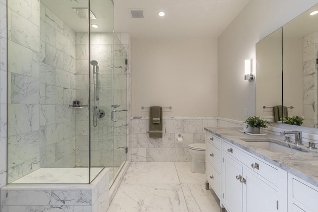 full bathroom with a stall shower, recessed lighting, vanity, toilet, and marble finish flooring