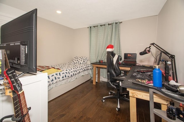 office space with dark wood-type flooring