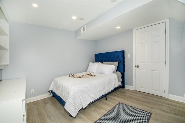 bedroom featuring light hardwood / wood-style floors