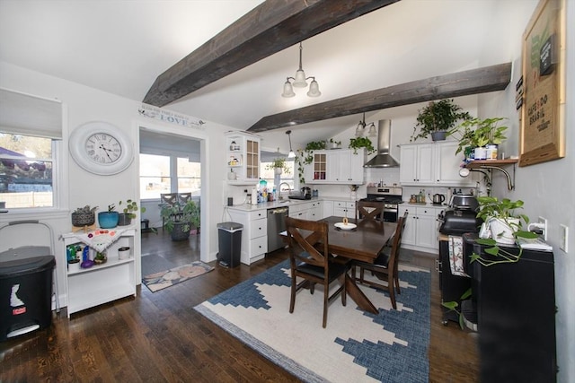 dining room with beam ceiling and dark wood-type flooring