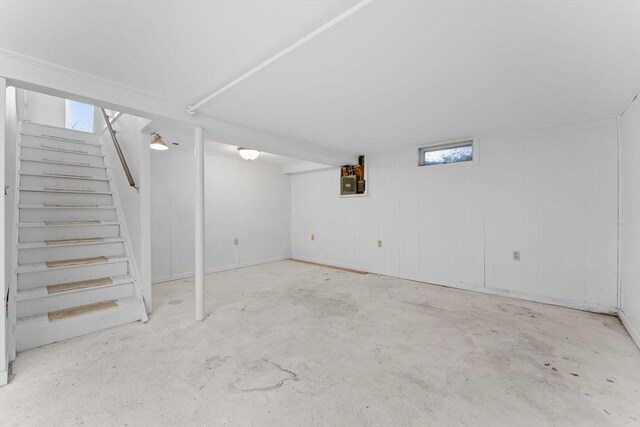 basement featuring stairs