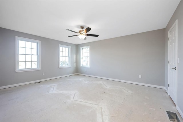 spare room with ceiling fan