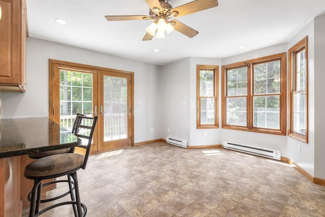 25 Hamilton Rd, Northborough, MA 01532 - dining area with a baseboard heating unit, french doors, recessed lighting, and a ceiling fan