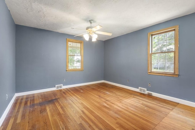 25 Hamilton Rd, Northborough, MA 01532 - unfurnished room featuring hardwood / wood-style floors, ceiling fan, and a textured ceiling