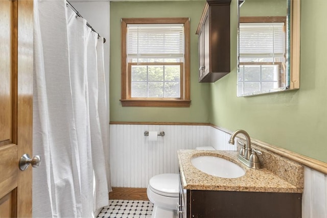 25 Hamilton Rd, Northborough, MA 01532 - bathroom with wainscoting, vanity, and a shower with shower curtain
