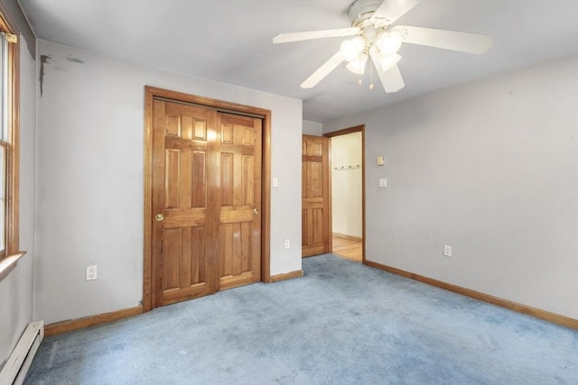 25 Hamilton Rd, Northborough, MA 01532 - unfurnished bedroom featuring baseboard heating, light colored carpet, and a ceiling fan