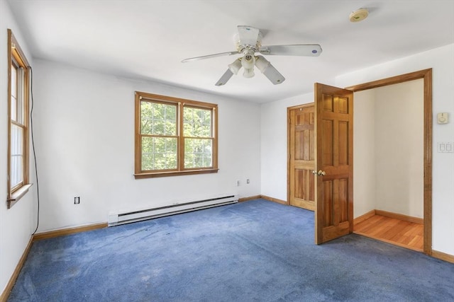 25 Hamilton Rd, Northborough, MA 01532 - unfurnished bedroom featuring a baseboard radiator, carpet floors, and a ceiling fan