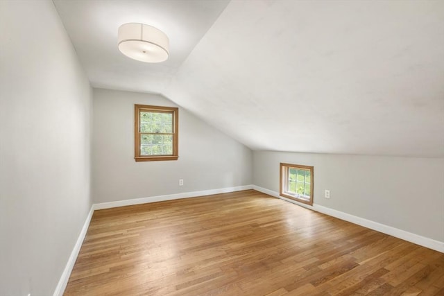 25 Hamilton Rd, Northborough, MA 01532 - bonus room with lofted ceiling, plenty of natural light, and light wood-style flooring