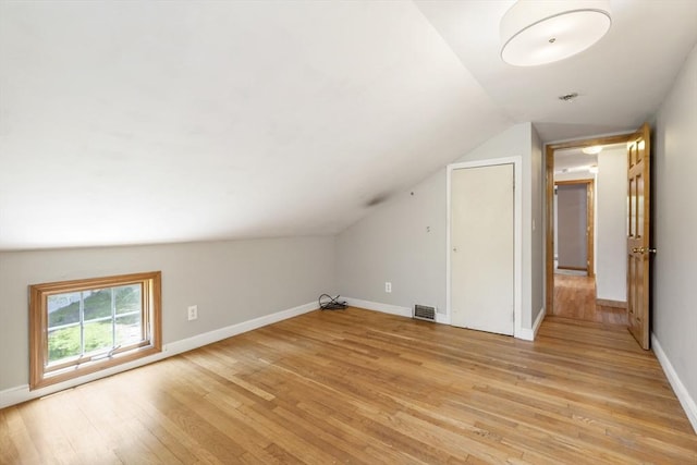25 Hamilton Rd, Northborough, MA 01532 - additional living space featuring light wood-type flooring and vaulted ceiling