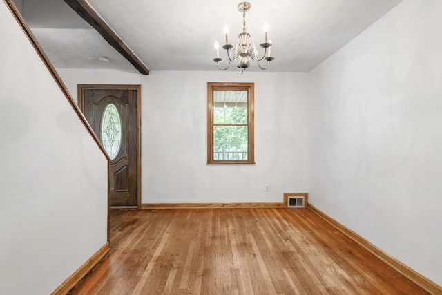 25 Hamilton Rd, Northborough, MA 01532 - unfurnished dining area featuring a chandelier and light wood-style flooring