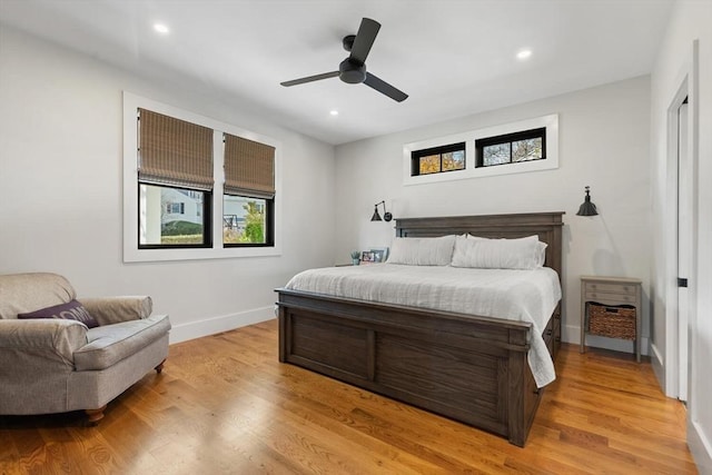 bedroom featuring ceiling fan and light wood-type flooring