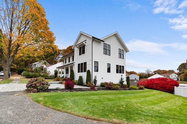 view of front of property with a front lawn