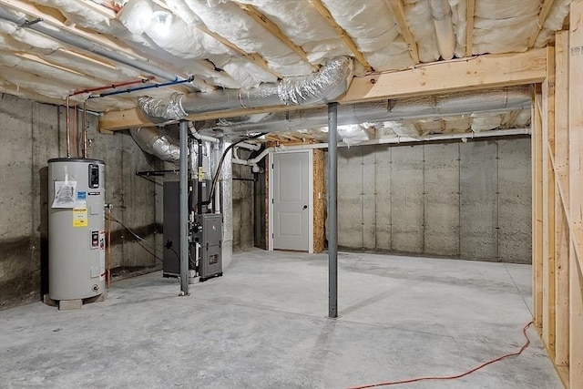 unfinished basement with water heater and heating unit