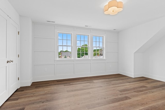 interior space with hardwood / wood-style flooring