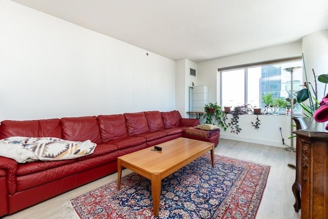 8-12 Museum Way Unit 1302, Cambridge, MA 02141 - living area featuring light wood-style flooring and baseboards