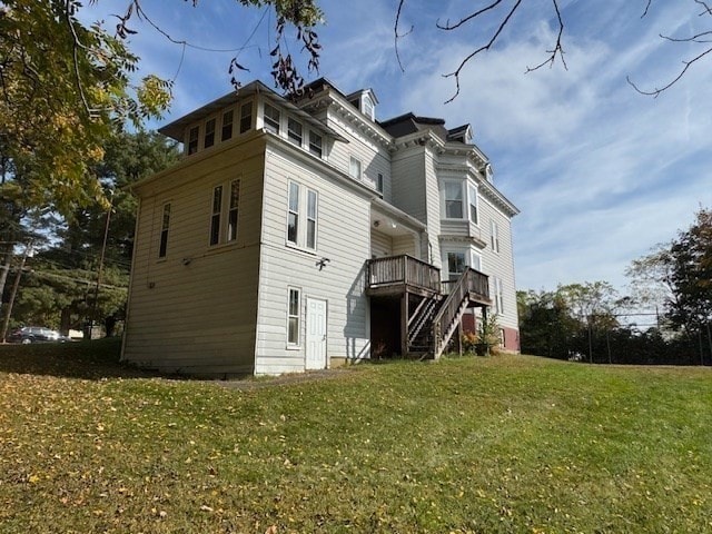 back of house with a yard