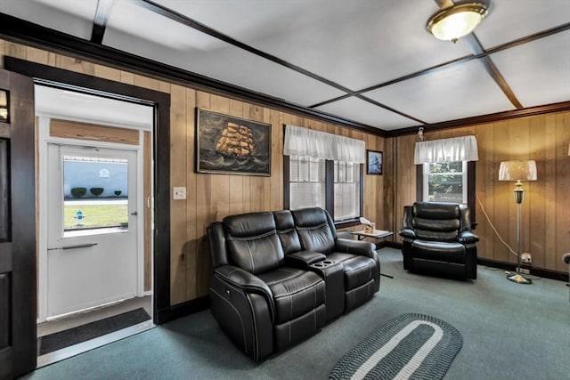 carpeted living area with baseboards