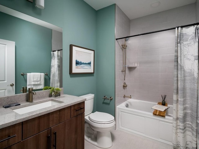 bathroom with toilet, shower / bath combination with curtain, and vanity