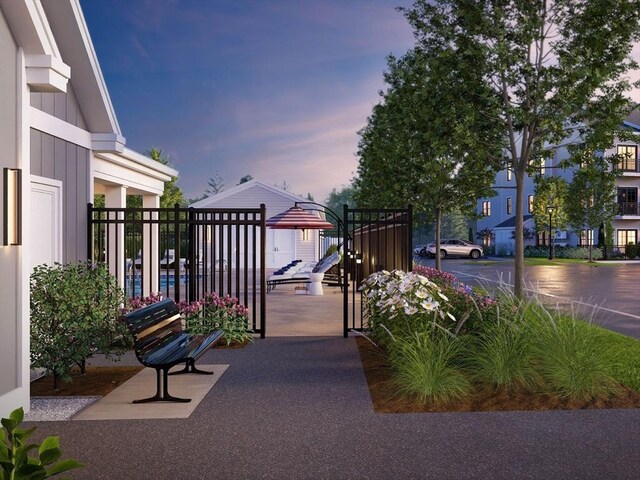 gate at dusk with fence