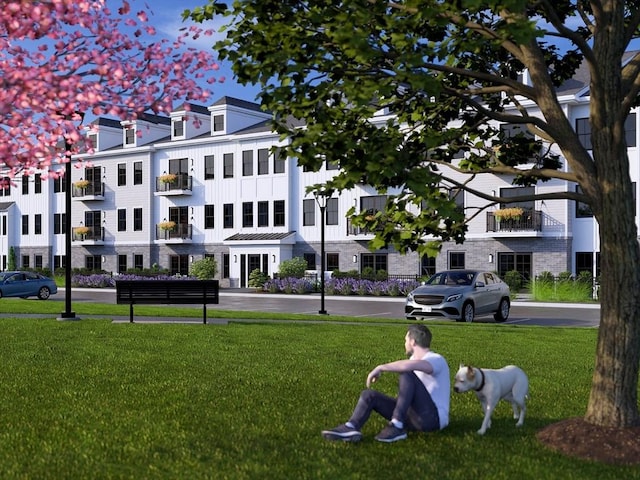 view of community featuring a yard