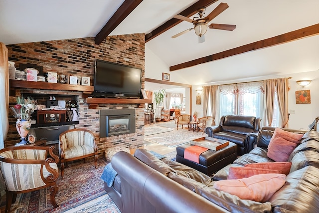 living room with vaulted ceiling with beams, brick wall, a fireplace, and ceiling fan