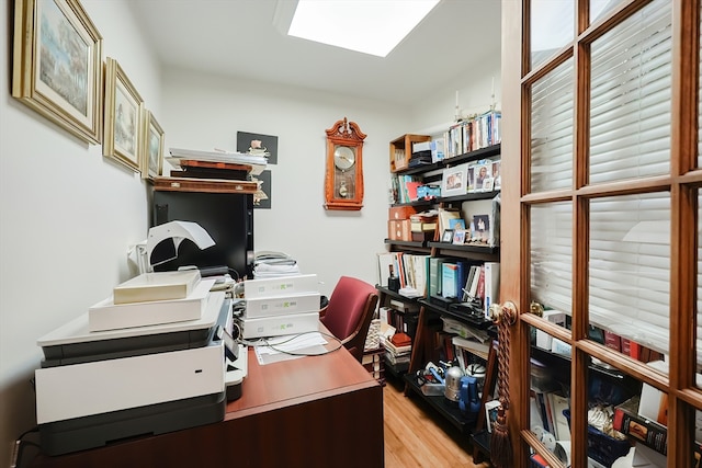 home office with light wood-type flooring