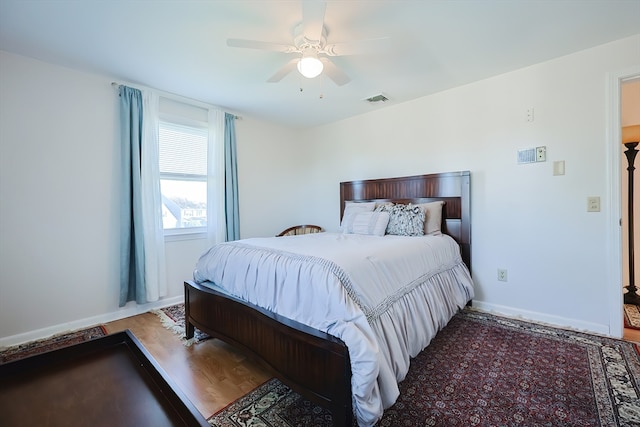 bedroom featuring wood-type flooring and ceiling fan