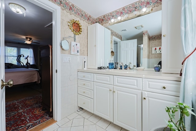 bathroom with vanity, tile patterned floors, and ceiling fan