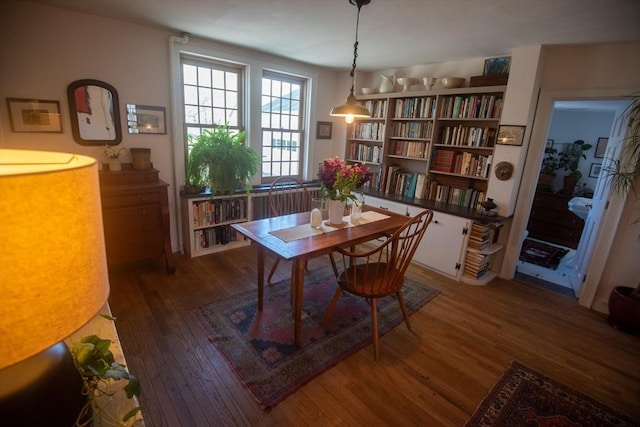dining room with wood finished floors