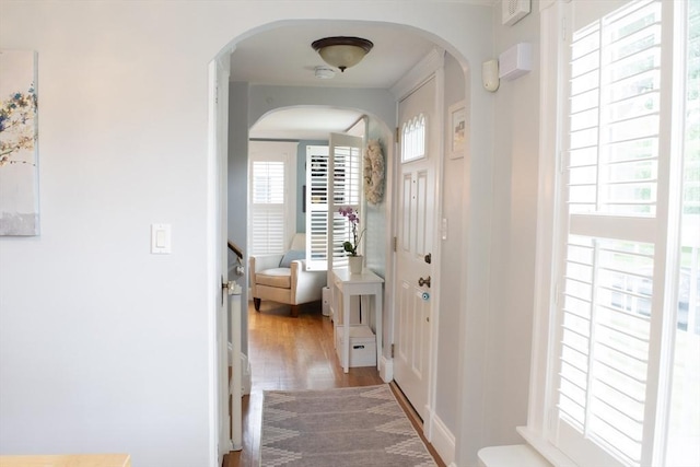 24 Garey St, Weymouth, MA 02189 - entrance foyer with arched walkways and wood finished floors