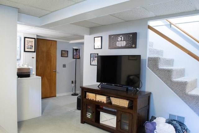 24 Garey St, Weymouth, MA 02189 - living area featuring washer / clothes dryer, light colored carpet, stairs, and a drop ceiling