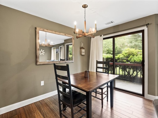 770 Salisbury Unit 302, Worcester, MA 01609 - dining room with a chandelier, healthy amount of natural light, and wood finished floors