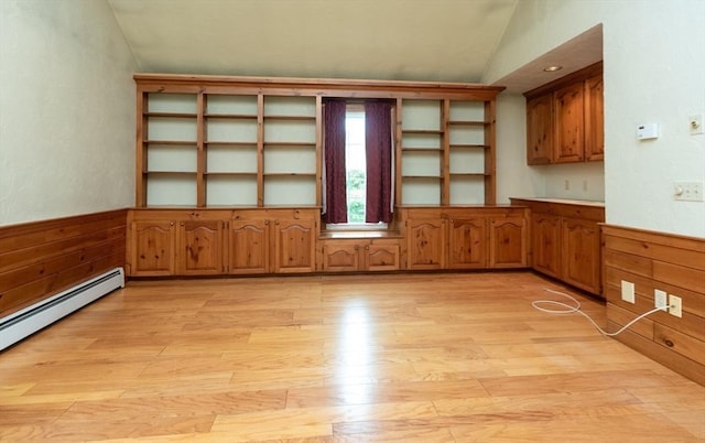 10 Eagle Rd, Winchendon, MA 01475 - empty room with lofted ceiling, light wood finished floors, a baseboard radiator, a wainscoted wall, and wood walls