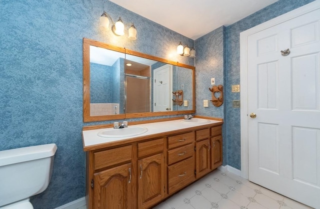 10 Eagle Rd, Winchendon, MA 01475 - bathroom featuring double vanity, a shower stall, toilet, baseboards, and tile patterned floors