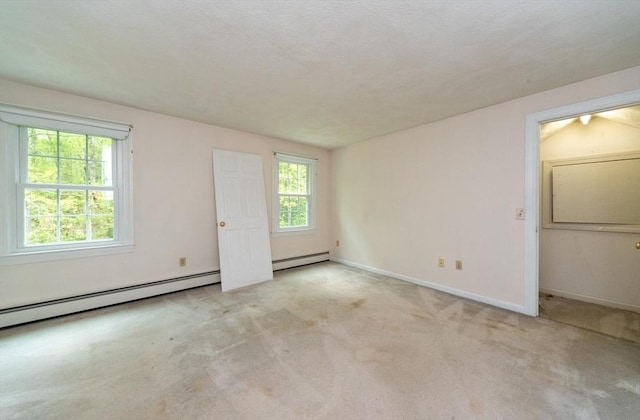 10 Eagle Rd, Winchendon, MA 01475 - spare room featuring light colored carpet, a baseboard radiator, and baseboards