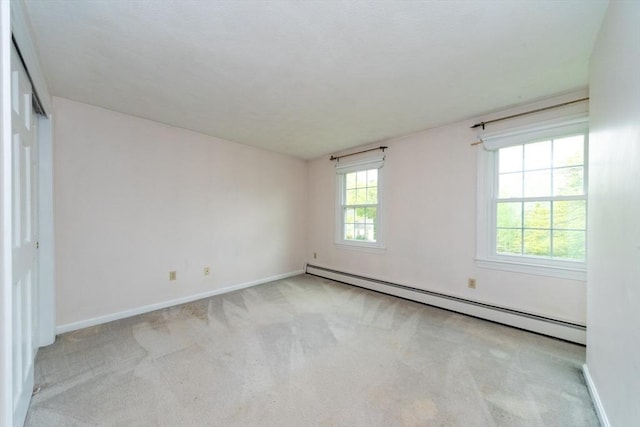 10 Eagle Rd, Winchendon, MA 01475 - spare room with baseboard heating, carpet, and baseboards