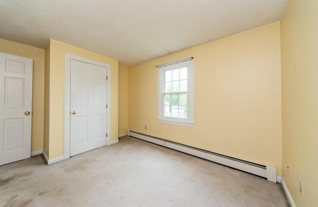 10 Eagle Rd, Winchendon, MA 01475 - unfurnished bedroom with a baseboard radiator, carpet flooring, and baseboards