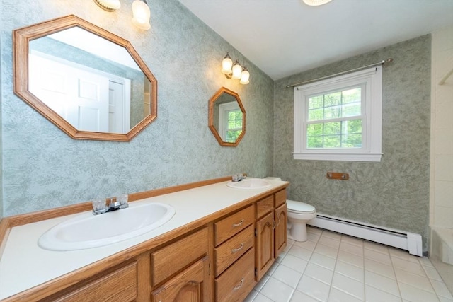 10 Eagle Rd, Winchendon, MA 01475 - bathroom featuring baseboard heating, double vanity, tile patterned floors, toilet, and wallpapered walls