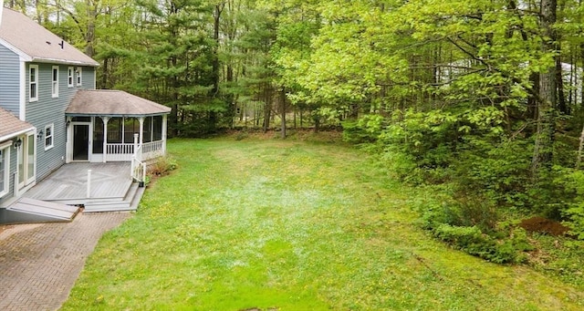 10 Eagle Rd, Winchendon, MA 01475 - view of grassy yard featuring a sunroom and a wooden deck