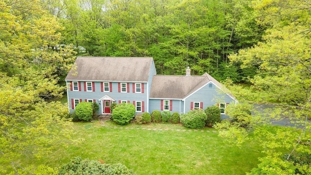 10 Eagle Rd, Winchendon, MA 01475 - colonial house featuring a wooded view, a front lawn, and a chimney